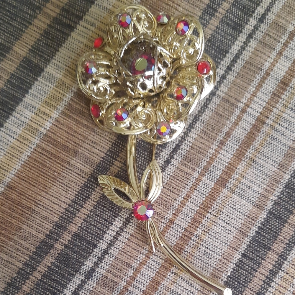 Sarah Coventry Gold-Tone Flower Brooch with Red Aurora Borealis Stones